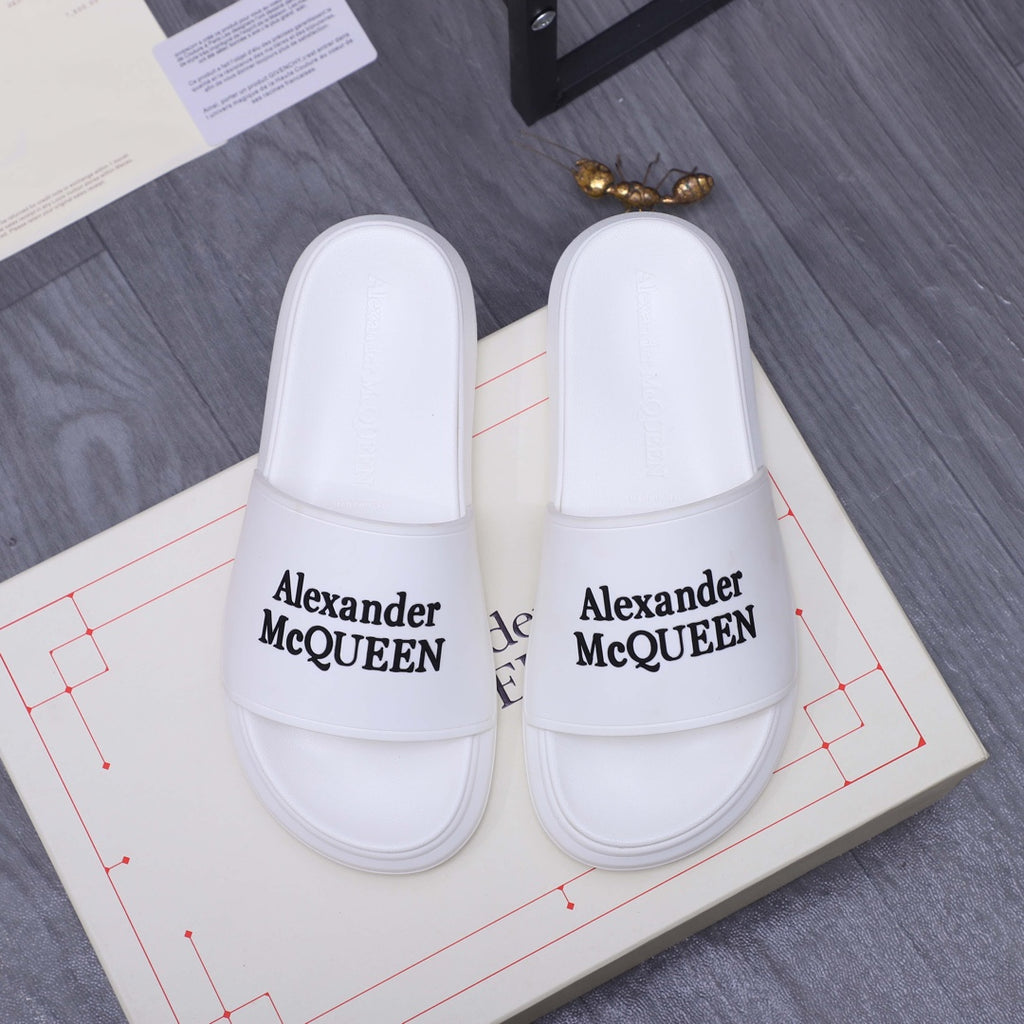 Alexander McQueen white leather slide sandals with logo strap, pair on box