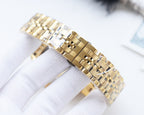 Gold-tone Rolex watch bracelet with alternating polished and brushed links