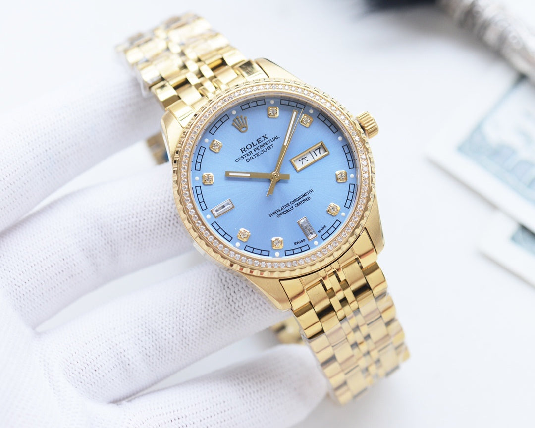 Two-tone Rolex watch with blue dial, gold bezel, and metal link bracelet