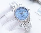 Rolex watch with blue dial and silver metal bracelet, date window at 3 o'clock