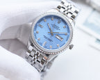 Rolex watch with blue dial and silver metal bracelet, diamond hour markers