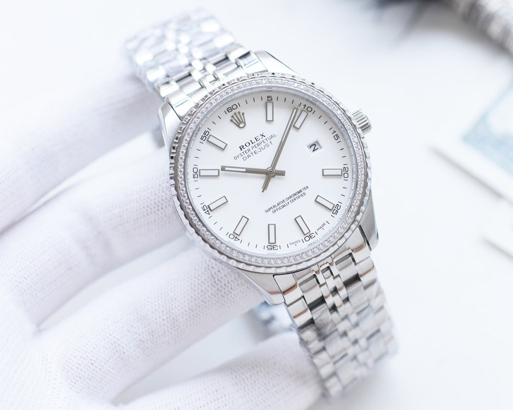 Rolex watch with white dial and silver metal bracelet, gold-accent hands
