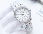 Rolex watch with white dial and silver metal bracelet, gold-accent hands