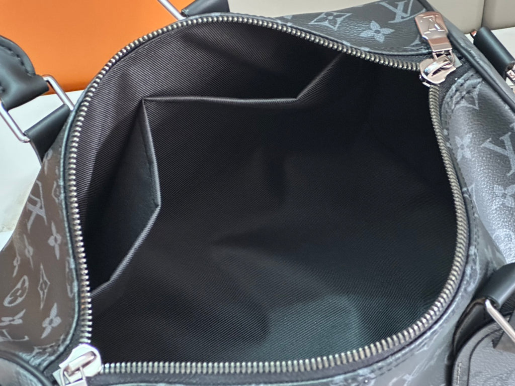 Louis Vuitton monogram bag interior with zip opening and smooth lining