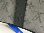 Louis Vuitton monogram bag interior label with stitched leather edge
