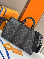Louis Vuitton monogram tote with front buckle strap and side zip pocket