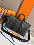 Louis Vuitton monogram handbag with top handles and front zipper pocket