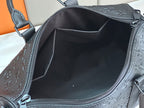 Men's Louis Vuitton bag interior view with zippered opening and inner lining