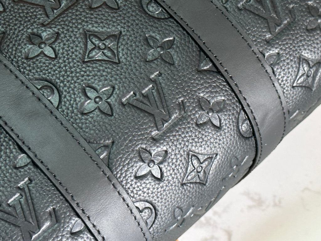 Men's Louis Vuitton monogram leather fabric with embossed floral pattern