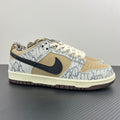 Low-top Nike Dunk SB sneakers with blue-and-white patterned panels, black swoosh, tan toe
