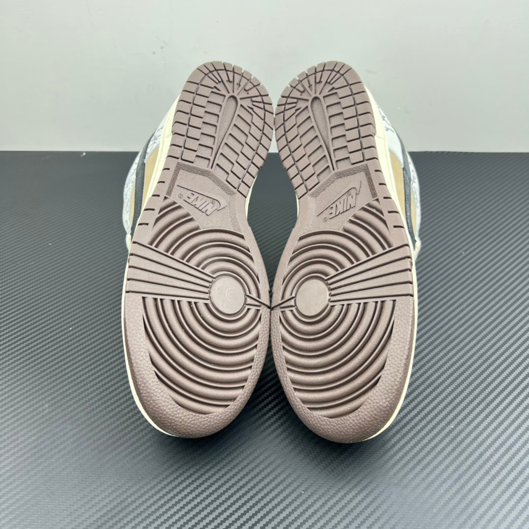 Nike Dunk SB sneakers with light gray treaded outsoles, beige and patterned upper