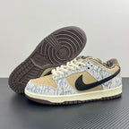 Nike Dunk SB sneakers showing textured dark outsole and blue-white patterned upper