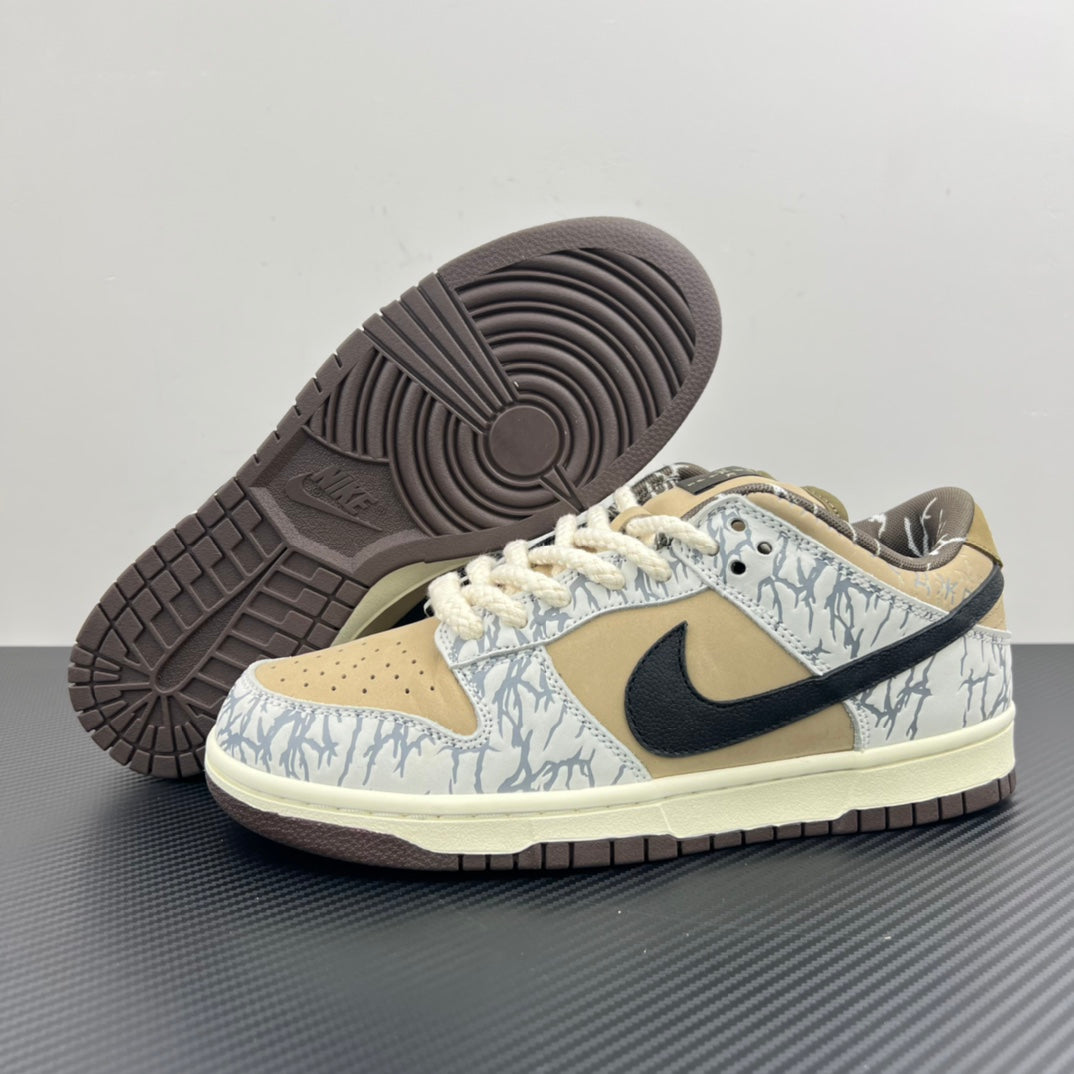 Nike Dunk SB sneakers showing textured dark outsole and blue-white patterned upper