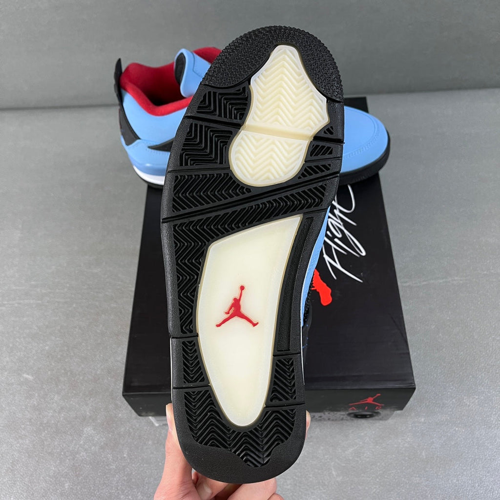 Air Jordan 4 outsole view with black traction and red Jumpman logo