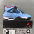Light blue Air Jordan 4 sneakers with black mesh panels and red accents