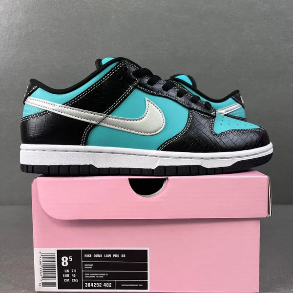 Nike SB Dunk Low sneakers in black, turquoise, and white with teal swoosh accents