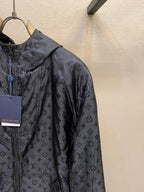 Black hooded jacket with all-over monogram pattern, full-zip front