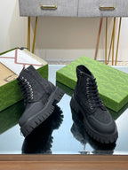 Gucci high-top lace-up sneakers in dark gray with textured monogram upper