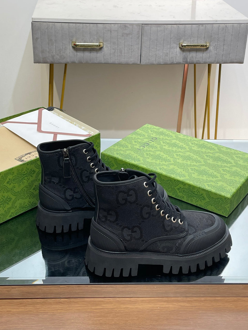 Gucci unisex high-top sneakers in dark gray with side zipper detail and lug sole