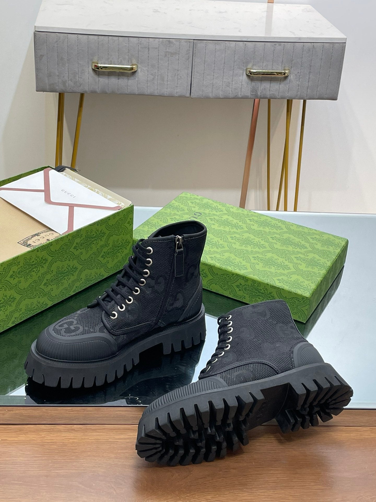 Gucci high-top sneakers in dark gray with lace-up front and thick outsole tread
