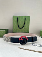 Gucci belt with GG canvas style strap and red-blue circular G buckle