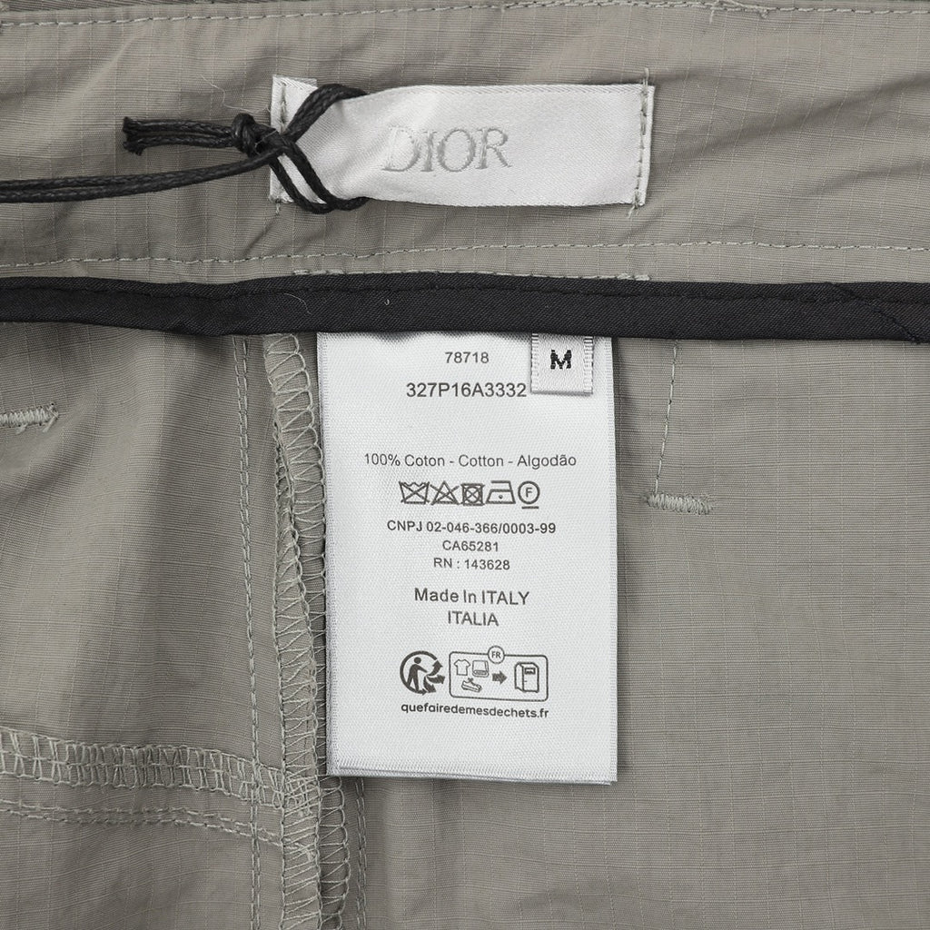 Dior pants, white size/brand tag inside waistband with Made in Italy info