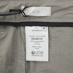 Dior pants, white size/brand tag inside waistband with Made in Italy info