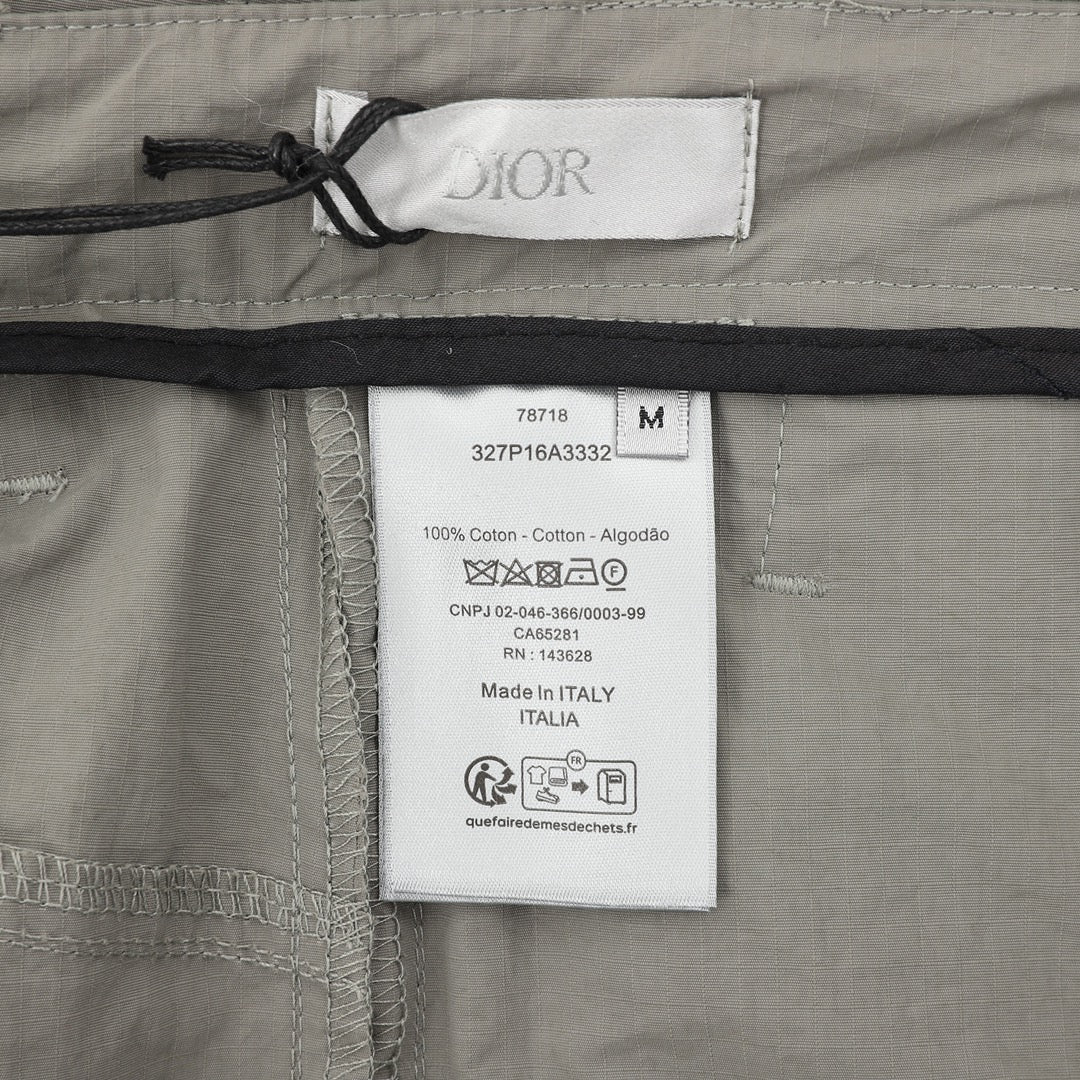 Dior pants, white size/brand tag inside waistband with Made in Italy info