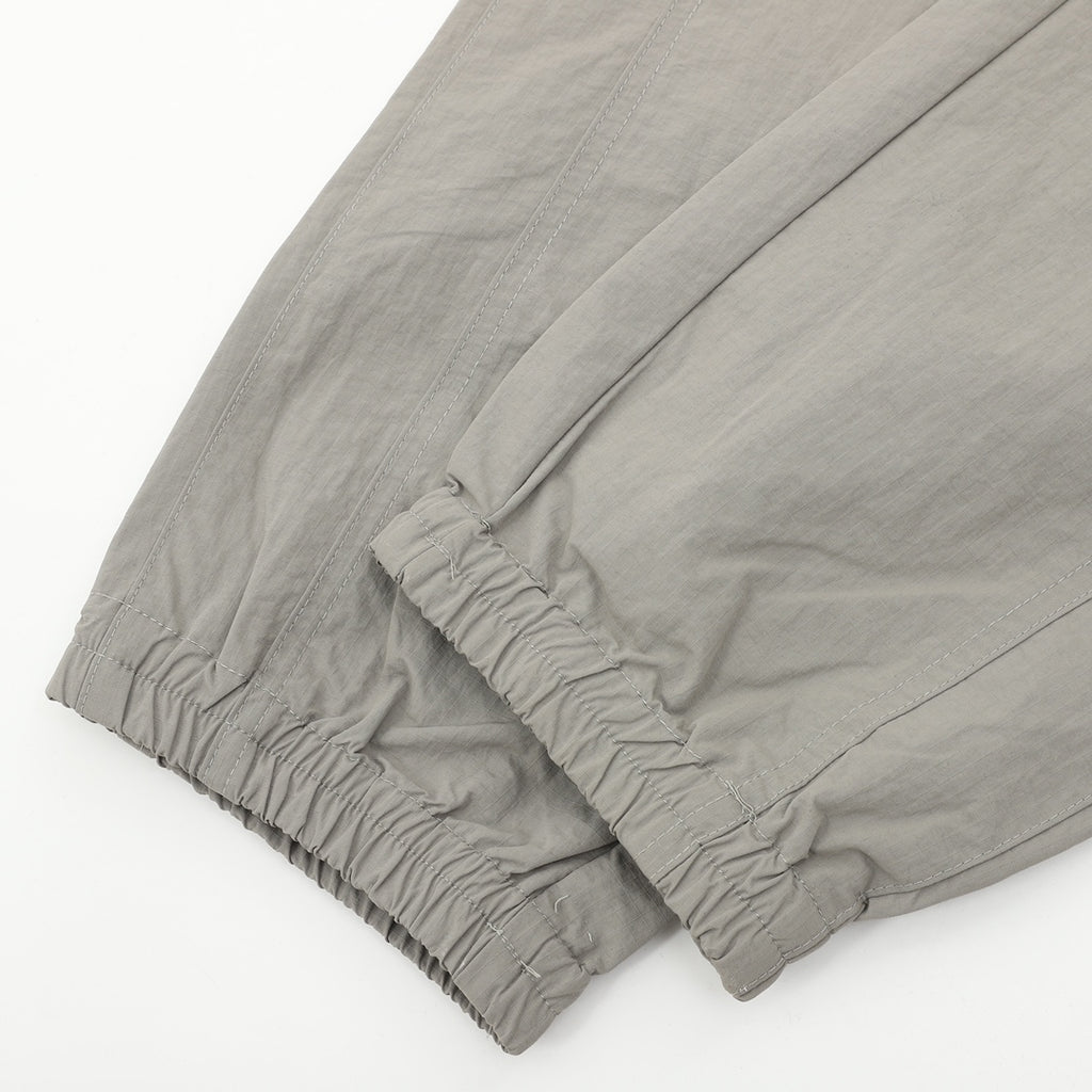 Dior pants, light gray cuffed hem with gathered elastic at ankle