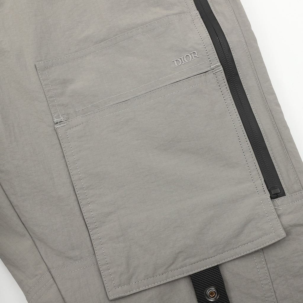 Dior pants, light gray fabric with Dior logo patch and side zipper stripe