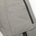 Dior pants, light gray fabric with Dior logo patch and side zipper stripe