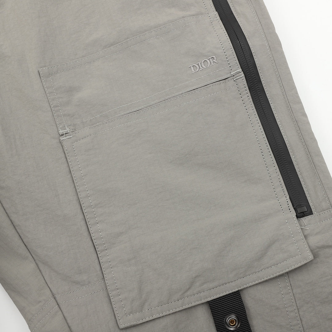 Dior pants, light gray fabric with Dior logo patch and side zipper stripe