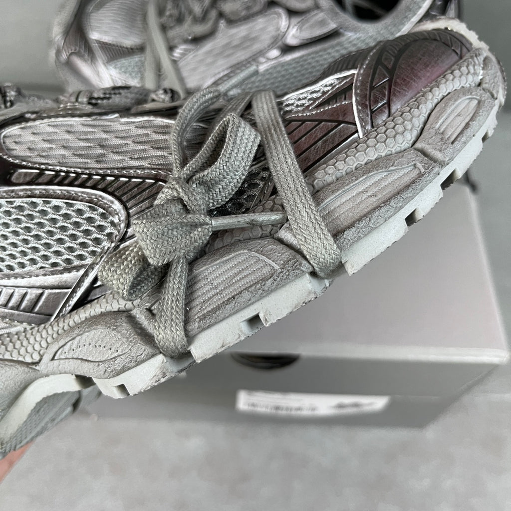 Balenciaga sneaker upper close-up with mesh panels and lace details