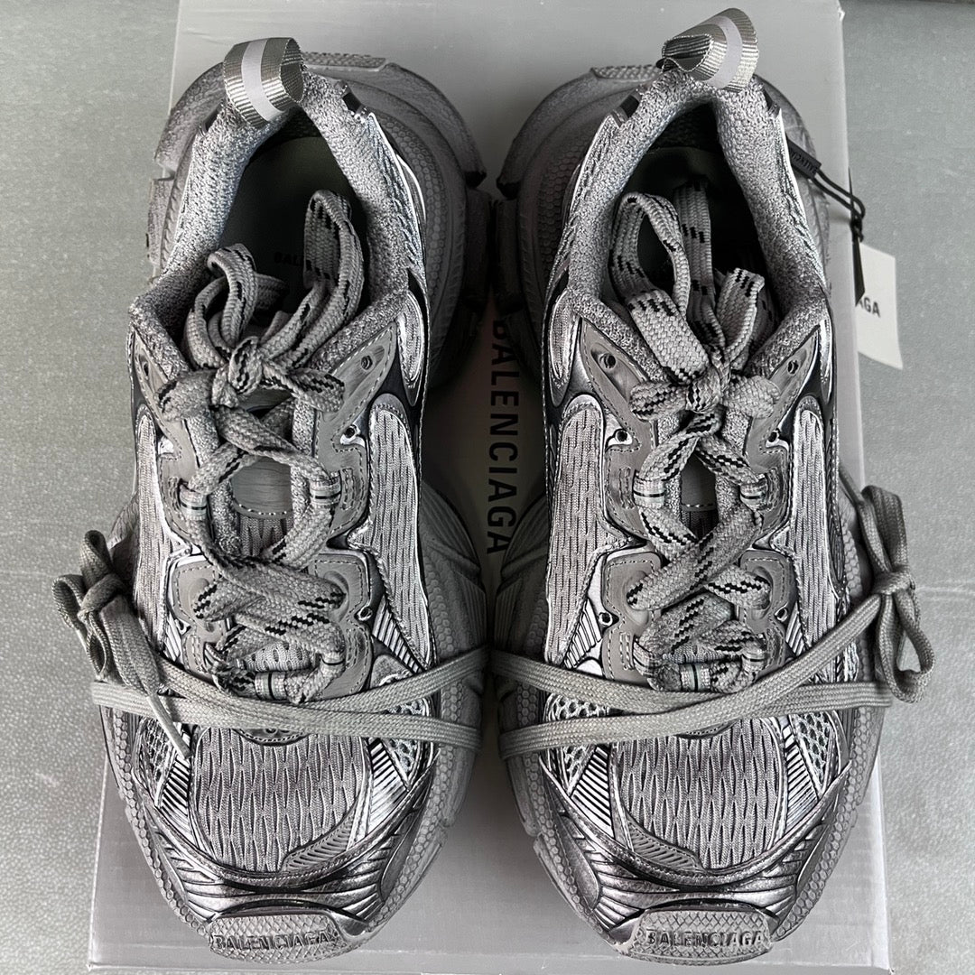 Balenciaga lace-up sneakers, tongue and logo heel detailing on both shoes