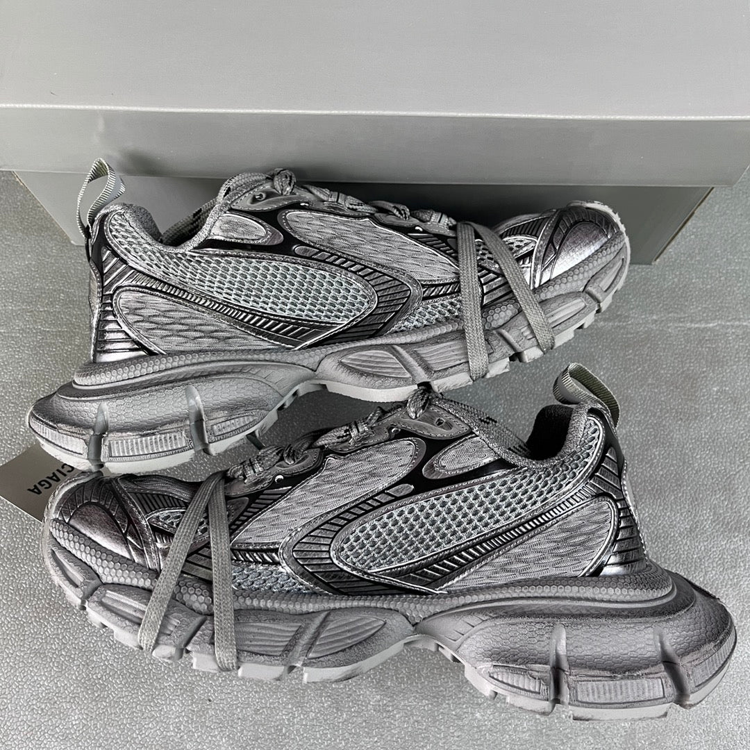 Balenciaga unisex chunky sneakers with mesh overlays and lace-up straps