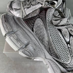 Balenciaga sneaker upper close-up with textured panels and lace-up straps