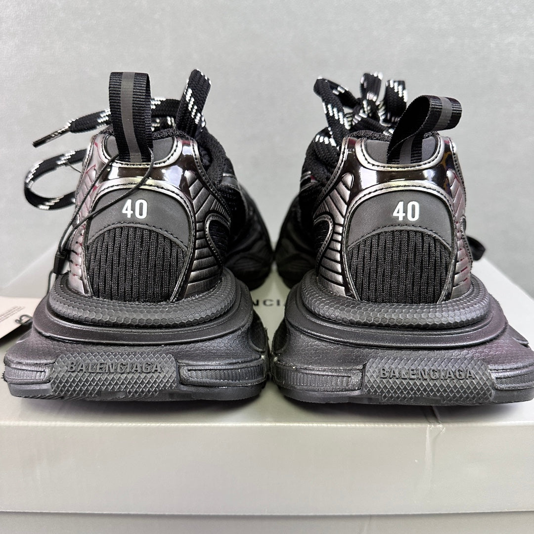 Balenciaga sneaker heels with black laces, chunky sole tread, and "40" mark