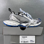 Balenciaga unisex sneakers on box, gray and black uppers with blue sole accents
