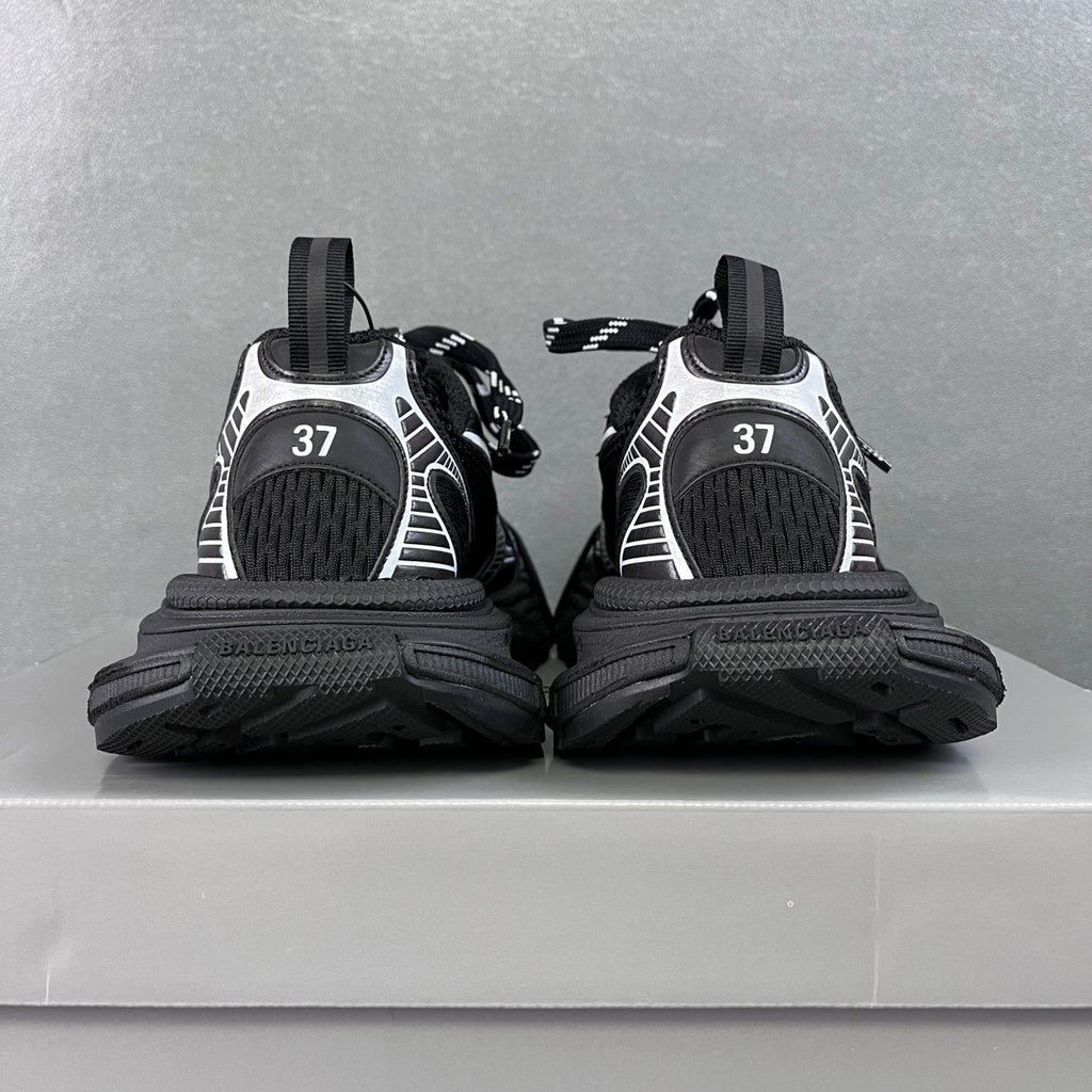 Balenciaga unisex sneakers heel view, black with white trim, size 37, chunky sole