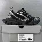 Balenciaga unisex sneakers, black and white, lace-up, chunky sole, on shoe box