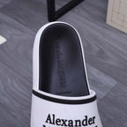 Alexander McQUEEN slide sandal interior view, black lining with patterned insole