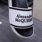Alexander McQUEEN slide sandal front, white strap with black logo text