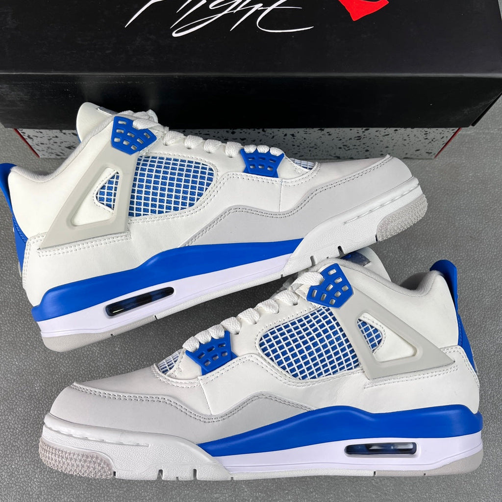 Pair of white and blue Air sneakers with mesh panels and visible side Air window.