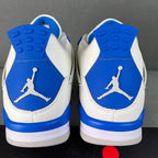Blue-and-white sneaker heels with Jumpman logo and textured rubber traction outsole.