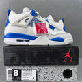White Air sneaker with blue net panels, blue accents, and lace-up closure.