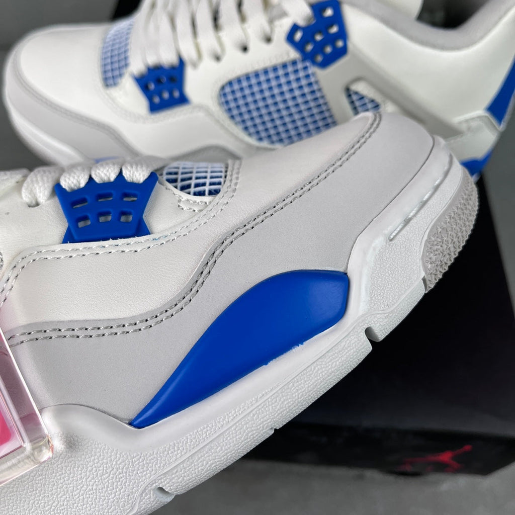 White sneaker side view with blue mesh panel, perforated blue detail, and laces.
