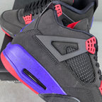 Black Air Jordan 4 sneaker with purple midsole, red accents, and lace-up tongue