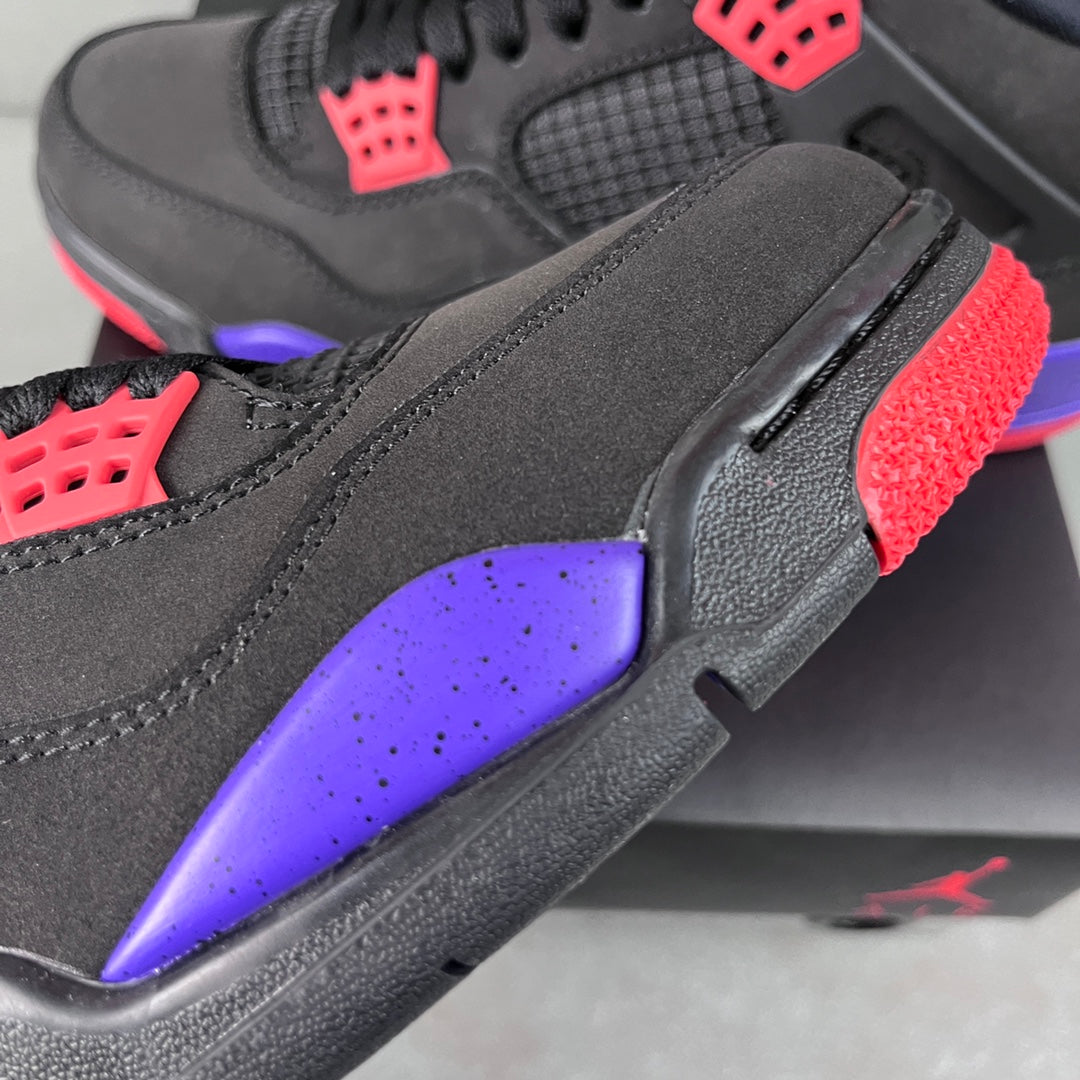 Black Air Jordan 4 sneaker side with textured panel, purple sole, and red heel