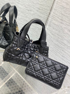 Black quilted Dior handbag with matching wallet pouch on strap