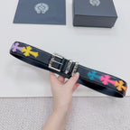 Chrome belt on hand: dark blue strap with colorful star pattern and silver rectangular buckle